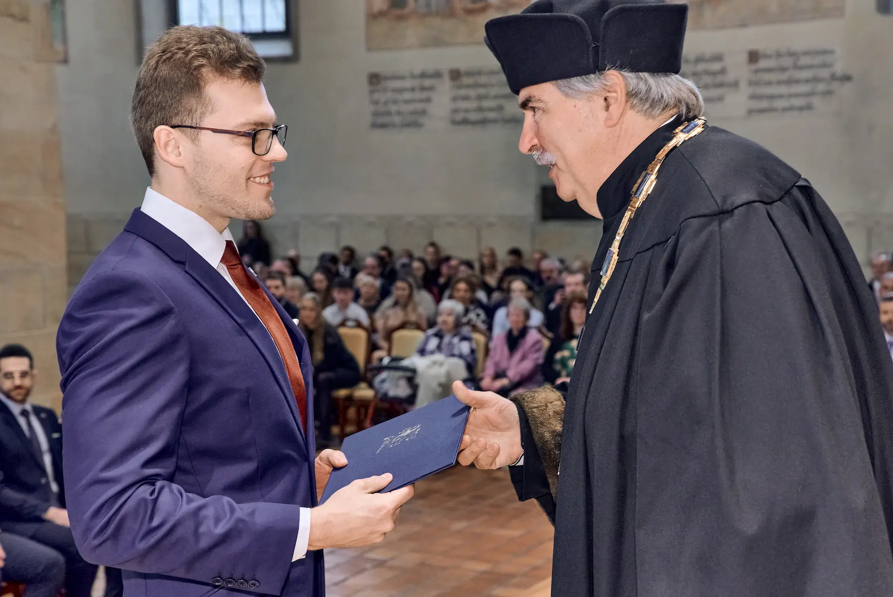 David Pelc při promoci